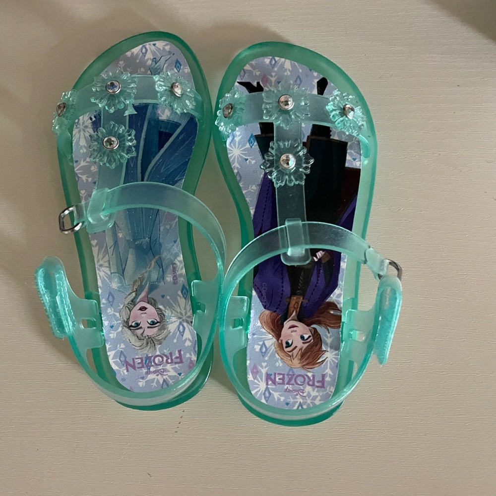 Brand new blue frozen jelly sandals size 11.
